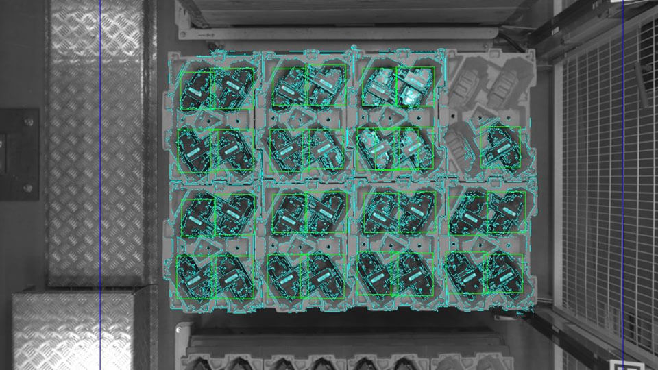 layer of coils in automated kitting cell, top view, black and white industry camera image, with bounding boxes